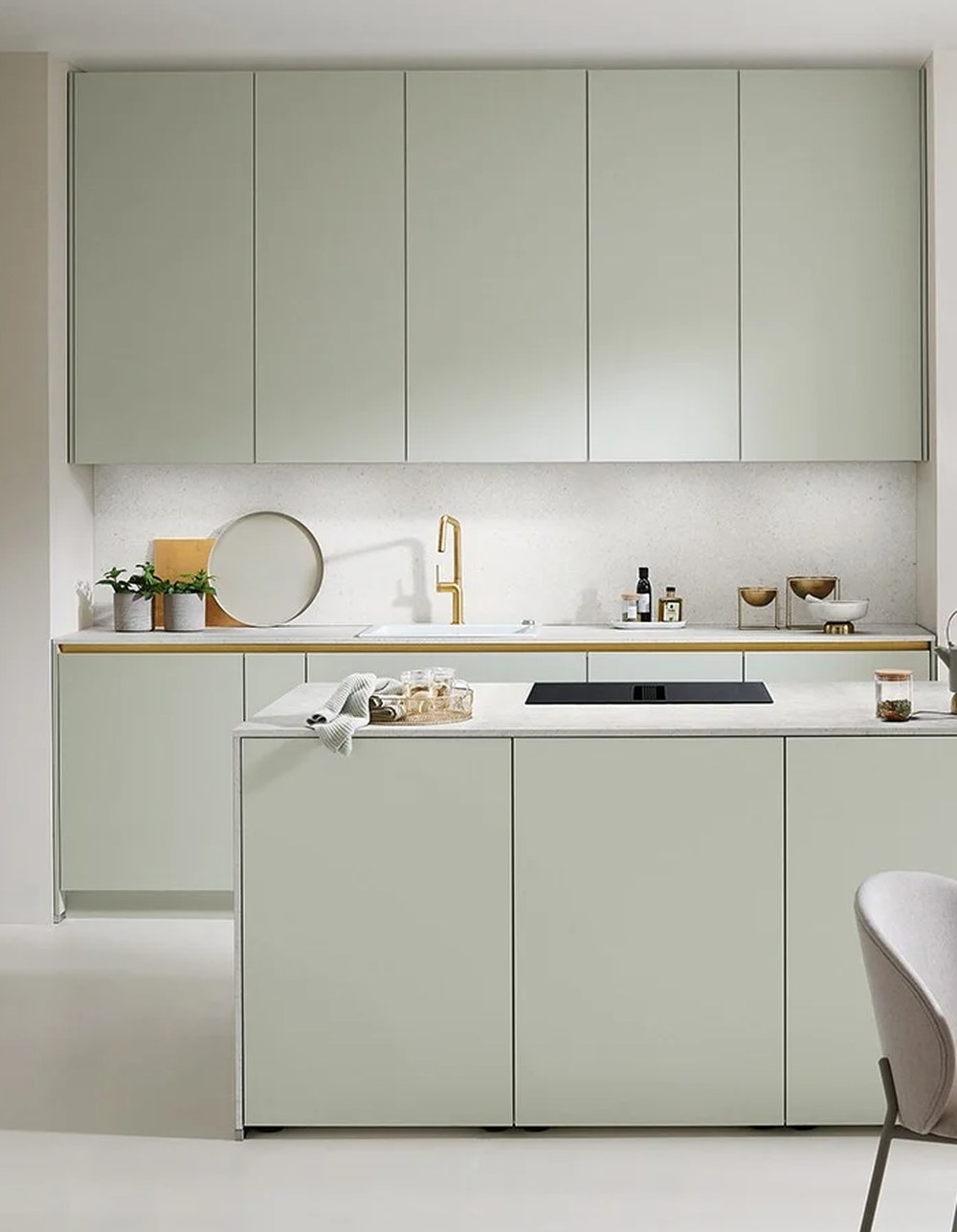 Nobilia Senso sage green German kitchen with handleless cabinetry and island