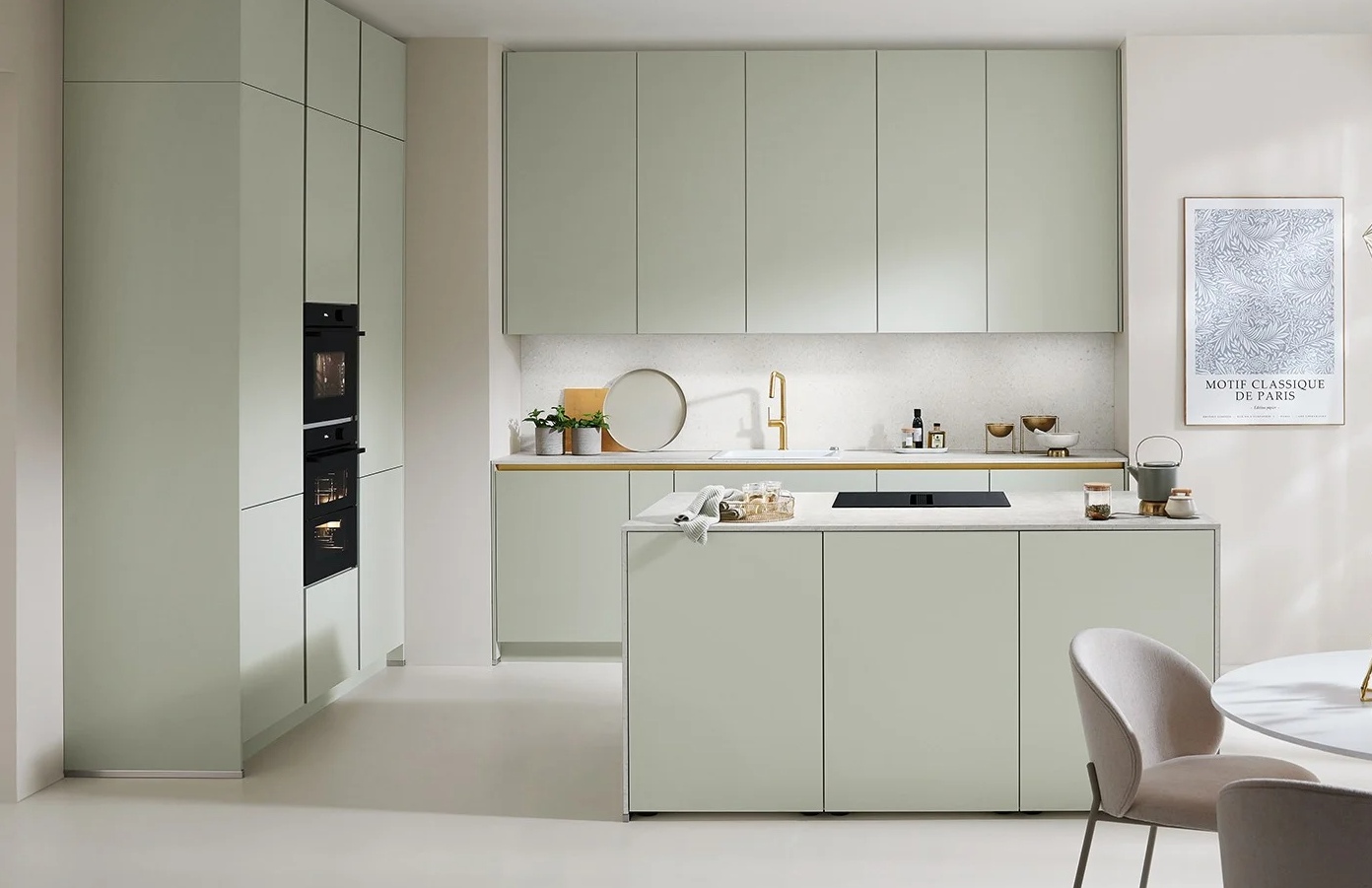 German kitchen with dark handleless cabinetry, island and integrated appliances