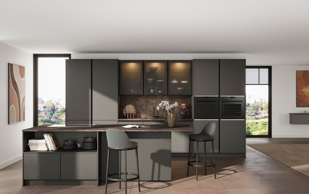 Graphite handleless kitchen with a large island and clear working zones