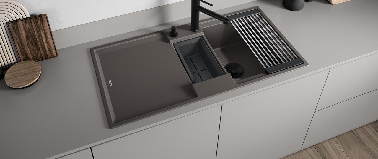 Blanco Adira Silgranit sink in volcano grey with a black mixer tap, integrated drainer and sliding colander